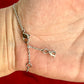 Worn on hand Dior lobster cluster with D charm of Vintage Dior silver tone rose beads chain bracelet 