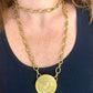 Collar de acero con porta bufandas vintage de Yves Saint Laurent: auténtica joyería reutilizada