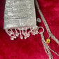 Side view of the beaded side One of a kind handmade Paco Rabanne repurposed silver pixel mesh bag
