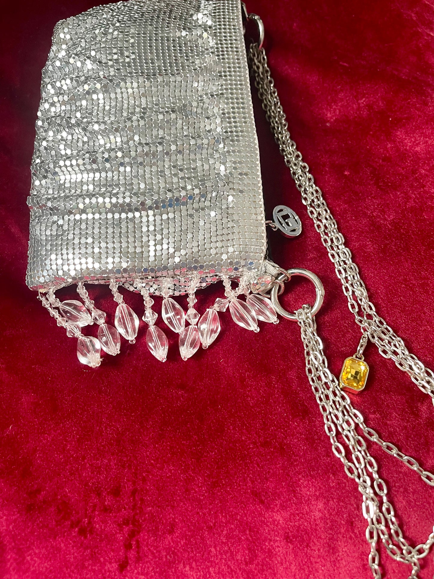 Side view of the beaded side One of a kind handmade Paco Rabanne repurposed silver pixel mesh bag