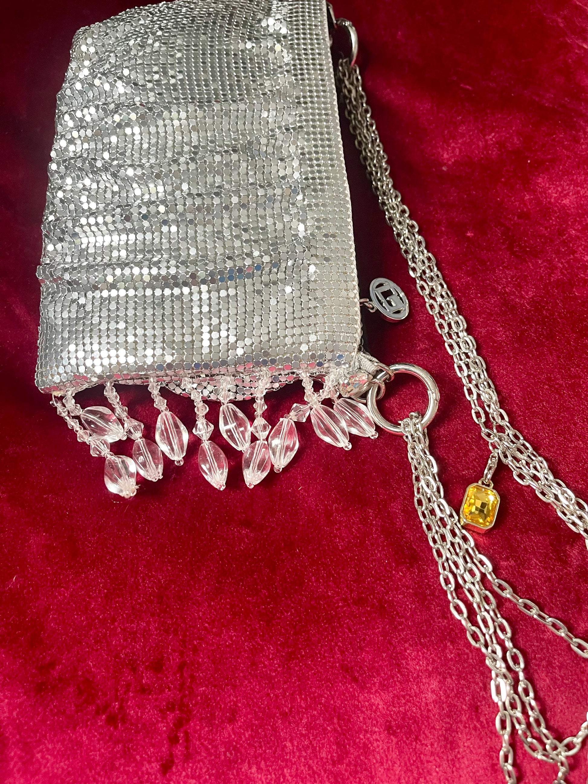 Side view of the beaded side One of a kind handmade Paco Rabanne repurposed silver pixel mesh bag