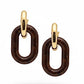 Paco Rabanne XL Link earrings in brown resin and gold metal, front view, 2025 collection, made in Italy