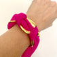 Gold stainless steel bracelet worn with silk Dior scarf styling