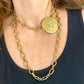 Collar de acero con porta bufandas vintage de Yves Saint Laurent: auténtica joyería reutilizada