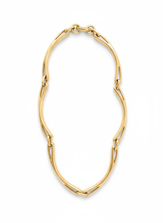 Full view of Vintage 80s Christian Dior gold-tone link necklace on a white background 