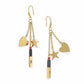 Front view of Yves Saint Laurent Beauté upcycled earrings with lipstick, star, and heart charms on gold-plated hoops On white background 