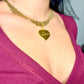 Vintage Refurbished 18KG Yves Saint Laurent 80s pendant Monet gold necklace  Worn by model side view 