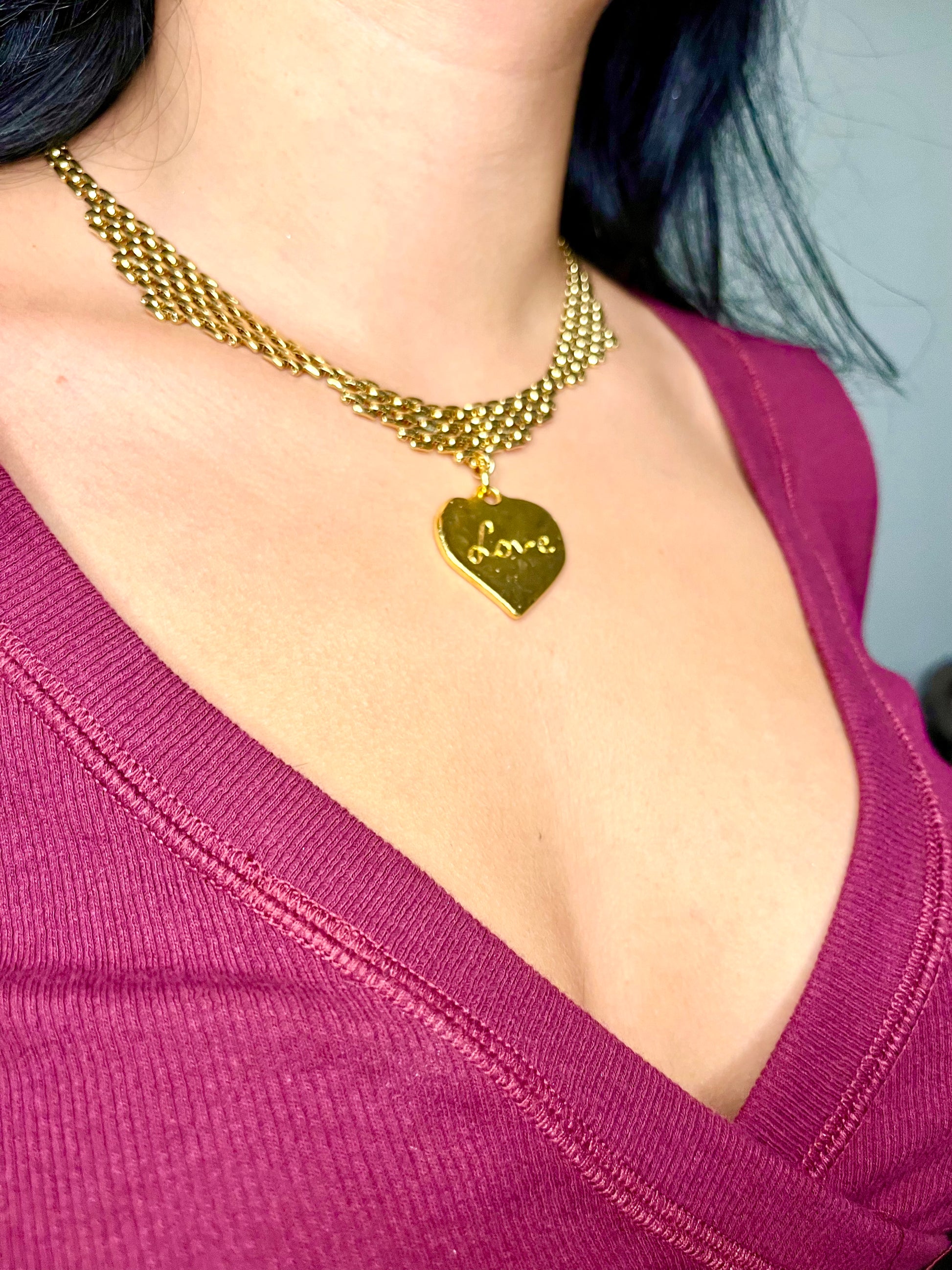 Vintage Refurbished 18KG Yves Saint Laurent 80s pendant Monet gold necklace  Worn by model side view 
