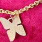 Showing hallmark YSL made in France vintage pendant Yves Saint Laurent enameled butterfly 