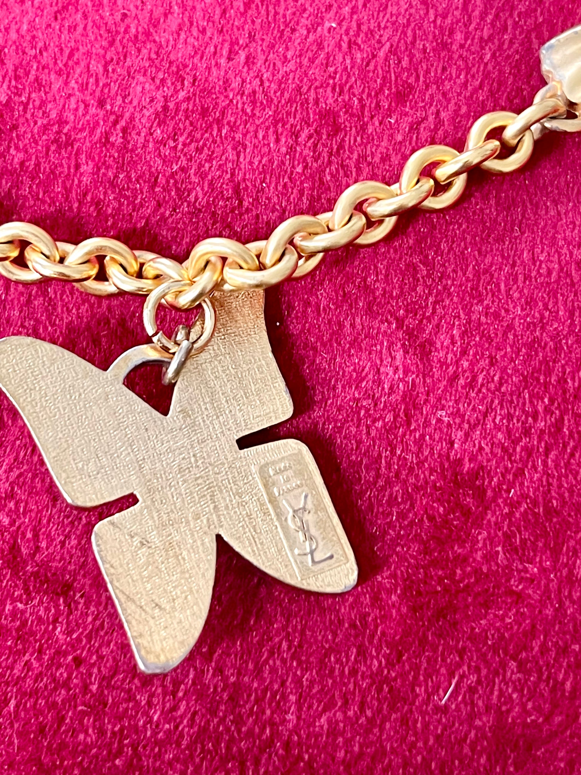 Showing hallmark YSL made in France vintage pendant Yves Saint Laurent enameled butterfly 