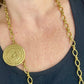 Collar de acero con porta bufandas vintage de Yves Saint Laurent: auténtica joyería reutilizada