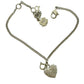 Pulsera auténtica vintage Dior con dije de corazón en tono plateado