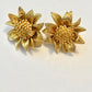 Orena Paris vintage gold sunflower-shaped earrings on a white background