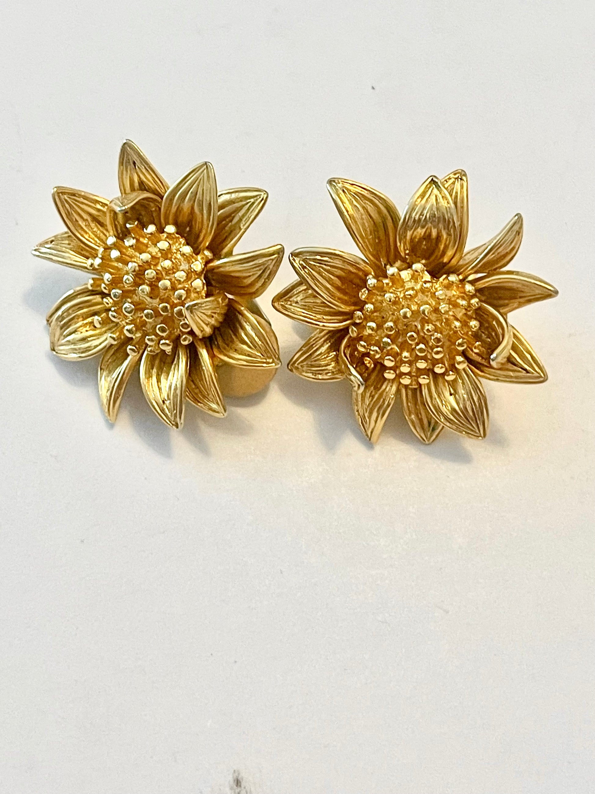 Orena Paris vintage gold sunflower-shaped earrings on a white background