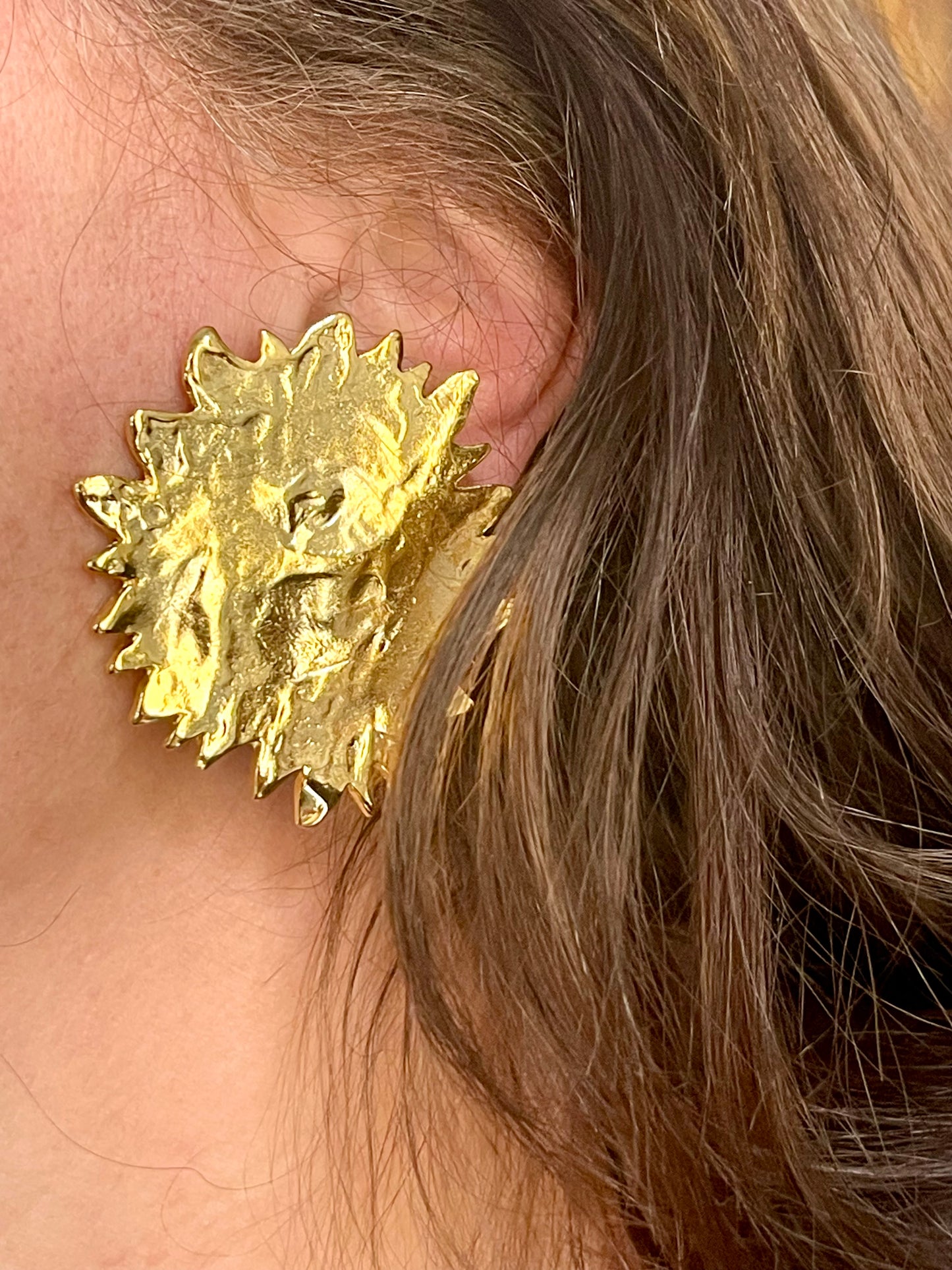 Pendientes vintage con forma de sol y diseño renovado de Yves Saint Laurent, años 80