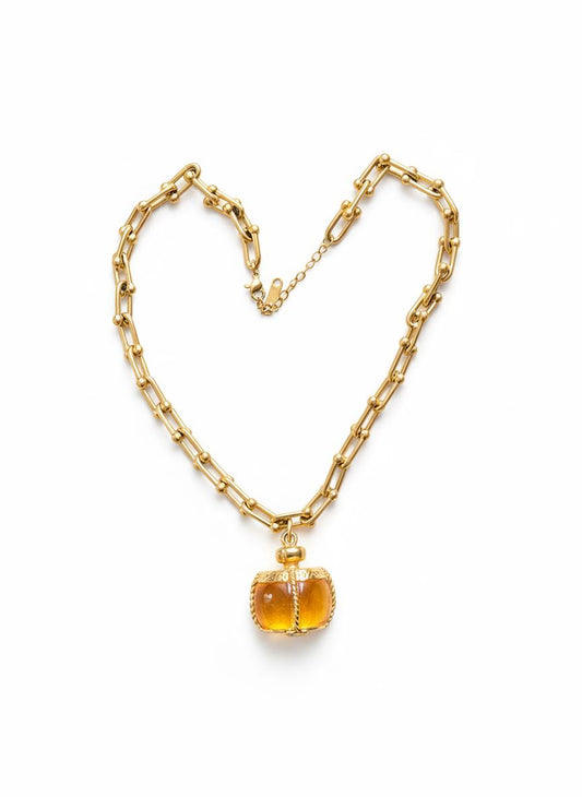 Vintage pendant from Yves Saint Laurent champagne perfume bottle 