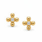  Yves Saint Laurent vintage gold tone cross clip-on earrings from the 1980s, showing rounded gold domes and square-cut center stones