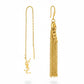 Gold tassel earring repurposed with chain and Yves Saint Laurent Libre charms on a white background