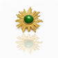 Vintage Yves Saint Laurent Sunburst Brooch – 1980s Gold Tone with Green Cabochon Rare Collector’s Piece