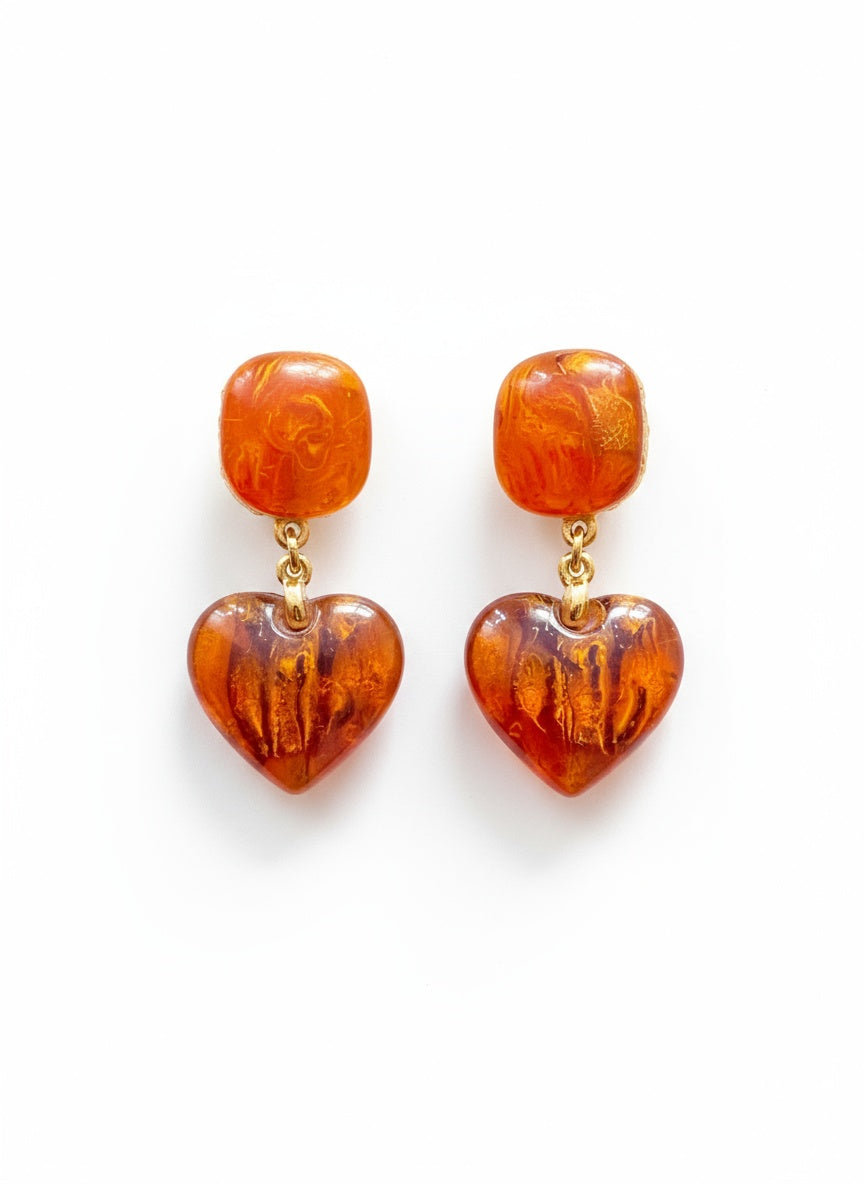 orange resin heart shaped earrings from yves saint laurent 