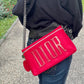 Pochette Dior en velours rouge upcyclé