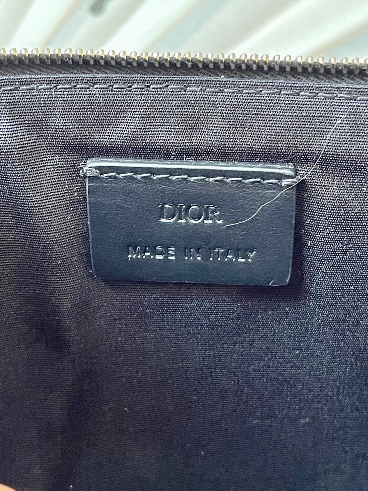 Pochette en cuir Dior modifié