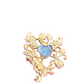 Broche de color de metal dorado Art Nouveau con corazón azul