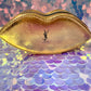 Tocador de labios dorados YSL
