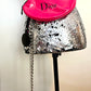 The kiss up cycled Dior pouch