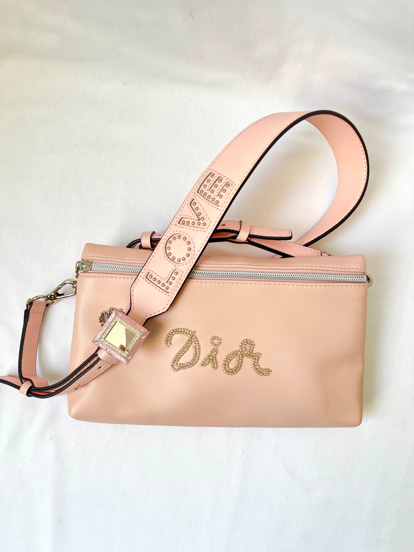 Pochette Dior rose clair upcyclée