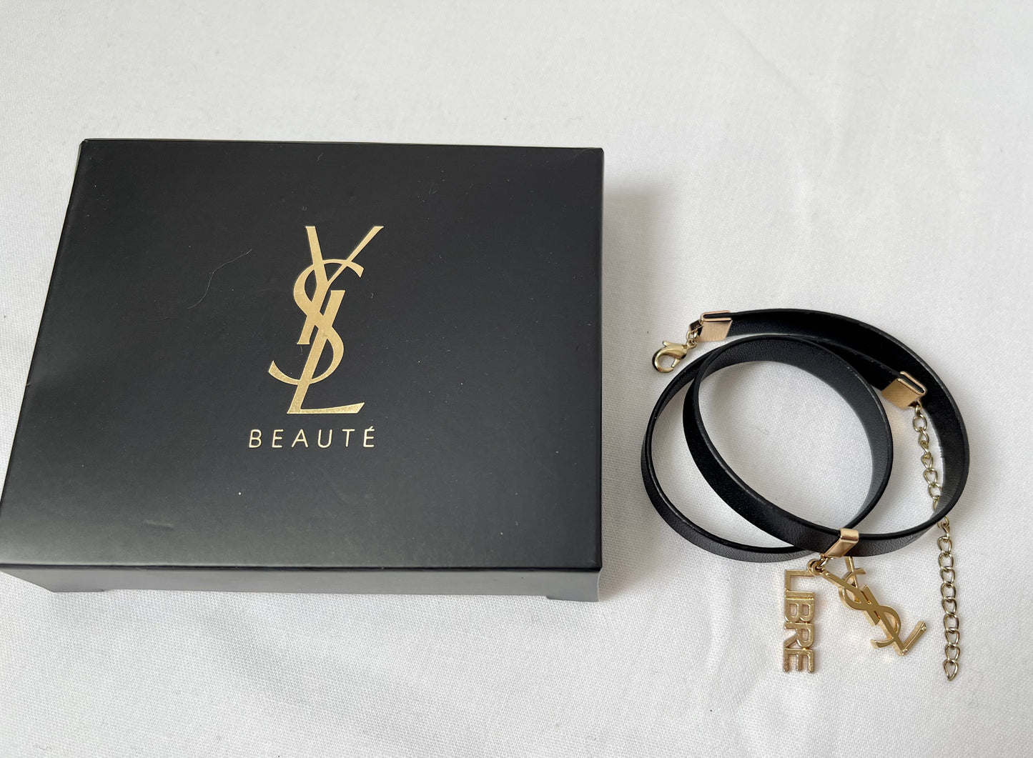 Black Leather Gold Charms  Yves Saint Laurent Parfums Bracelet