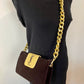 Bolso clutch YSL de terciopelo marrón