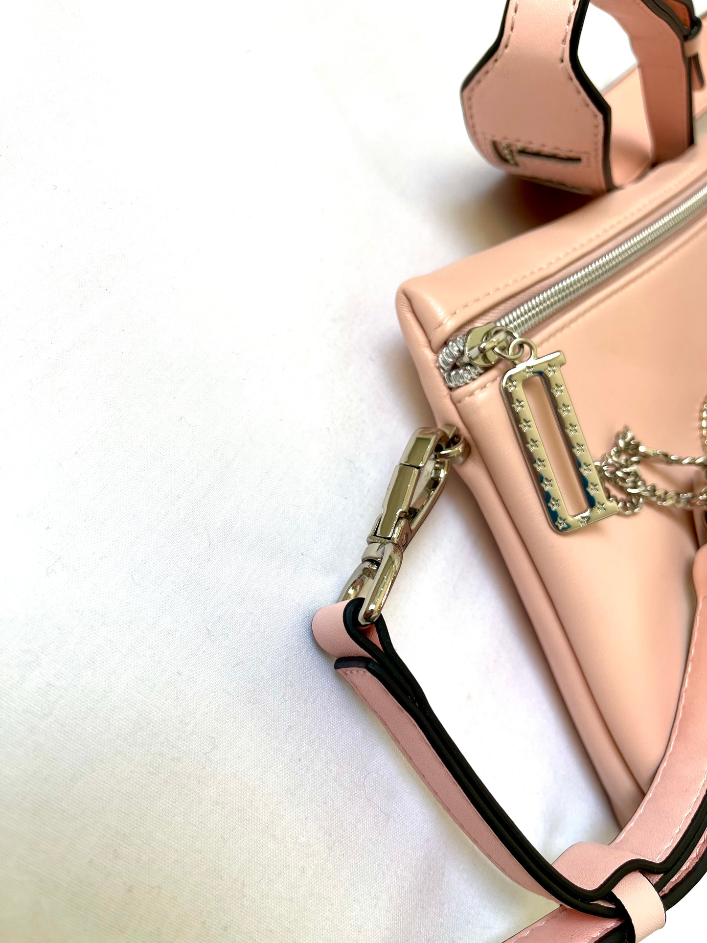 Pochette Dior rose clair upcyclée