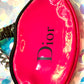 The kiss up cycled Dior pouch