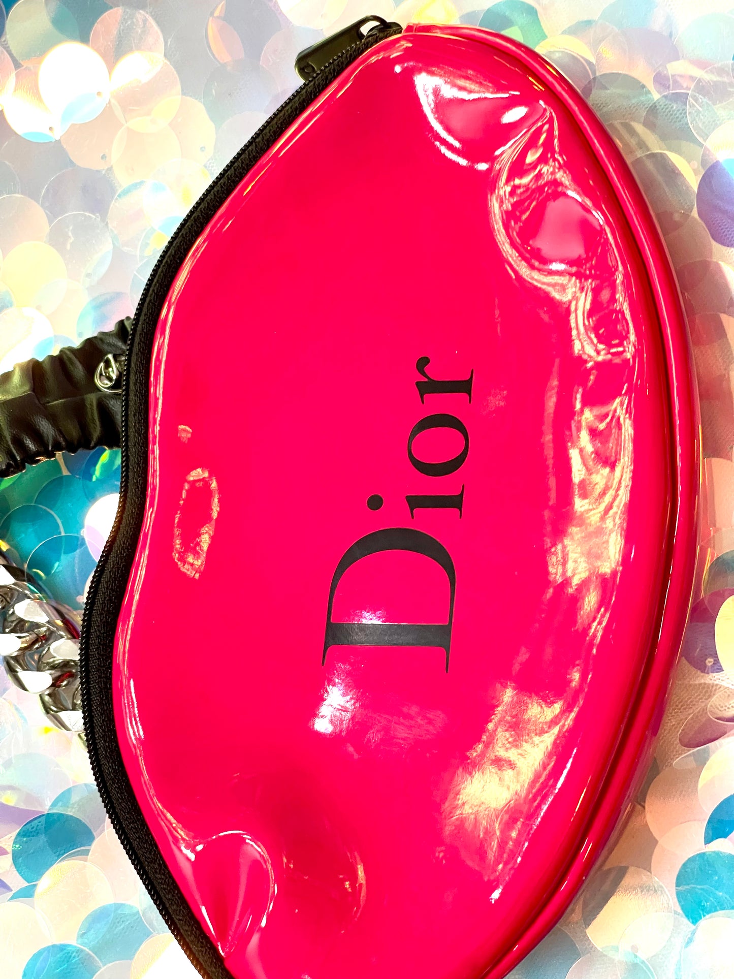 The kiss up cycled Dior pouch