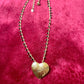 Yves Saint Laurent golden heart pendant