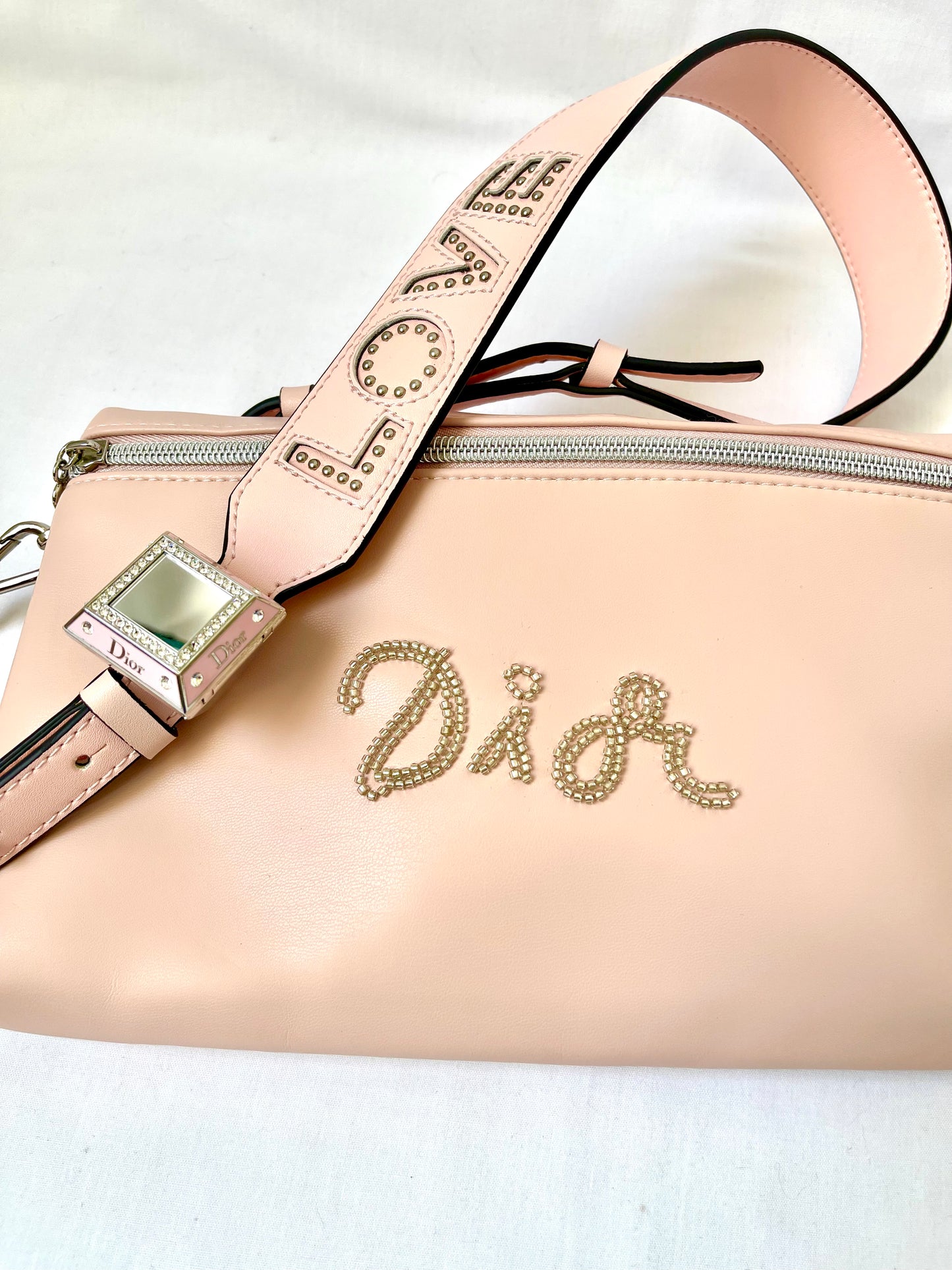 Pochette Dior rose clair upcyclée