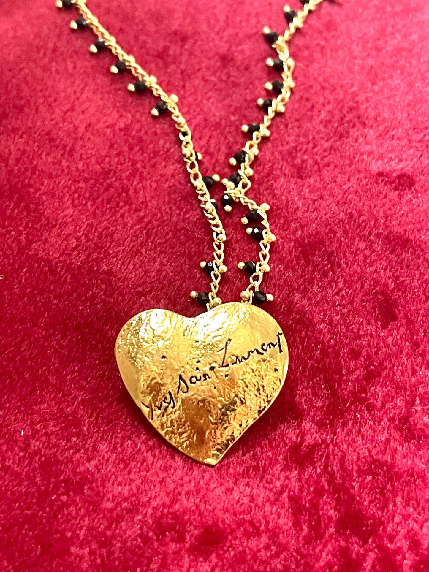 Yves Saint Laurent golden heart pendant