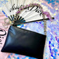 Up cycled black clutch