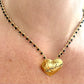 Yves Saint Laurent golden heart pendant
