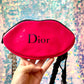 The kiss up cycled Dior pouch