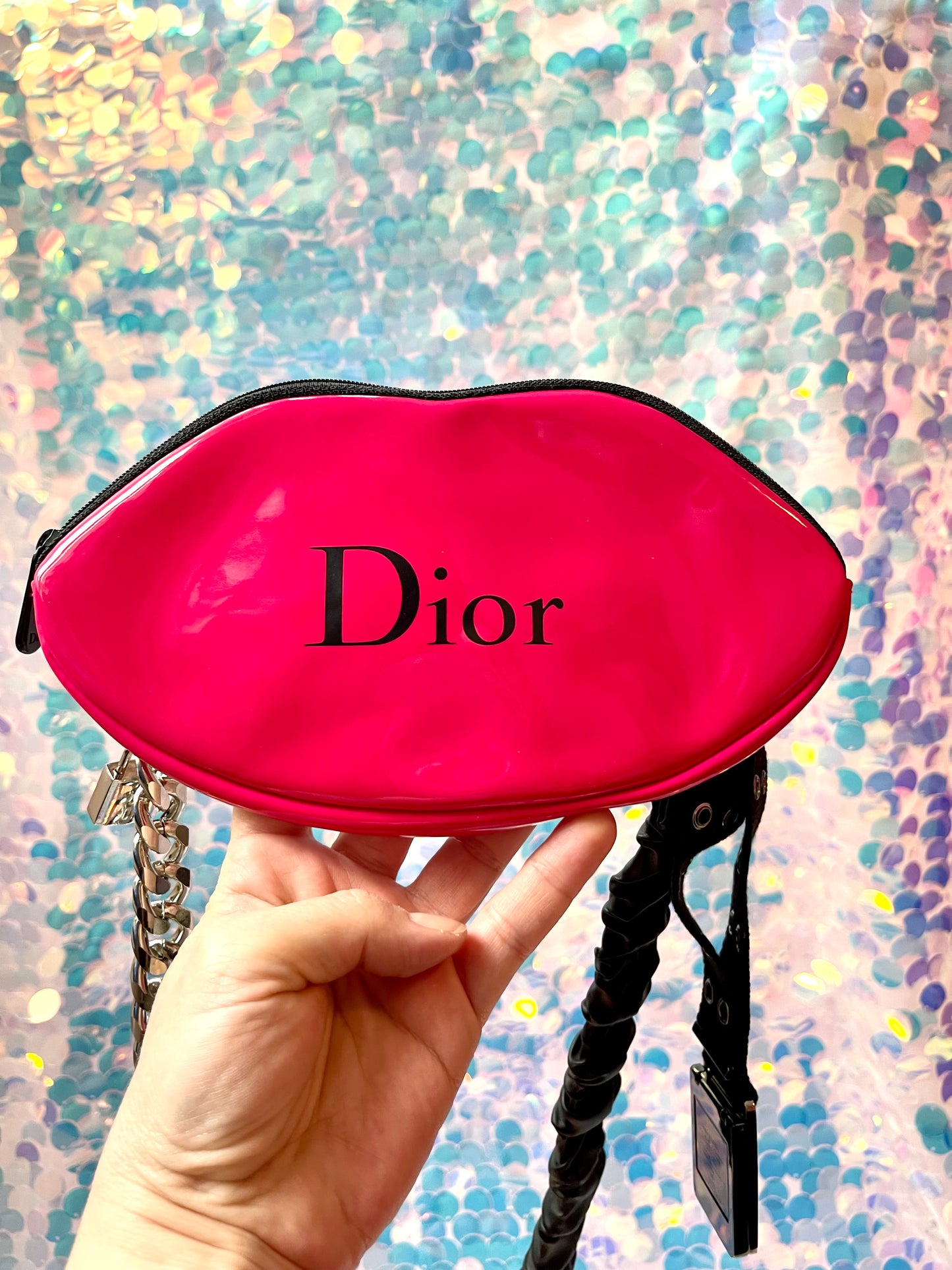 The kiss up cycled Dior pouch