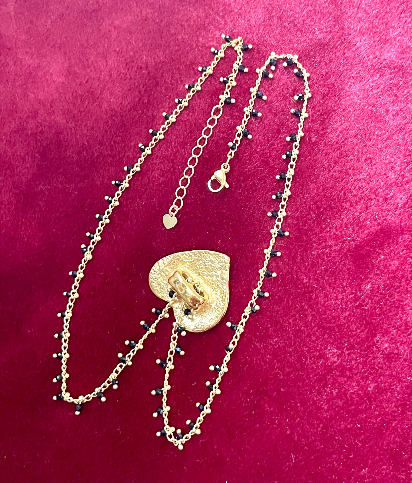 Yves Saint Laurent golden heart pendant