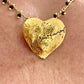 Yves Saint Laurent golden heart pendant